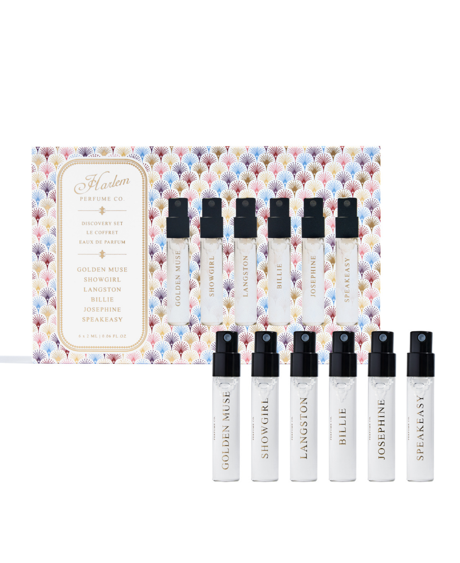 A Harlem Perefume. gift set featuring a decorative patterned box and ten clear glass perfume sample vials with black spray tops, arranged on a white background.