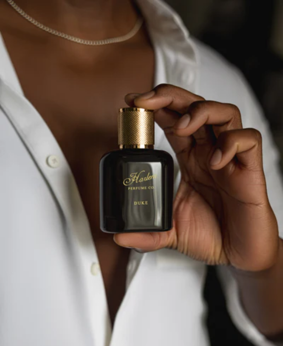 This is an image of our male model holding the Duke eau de parfum.