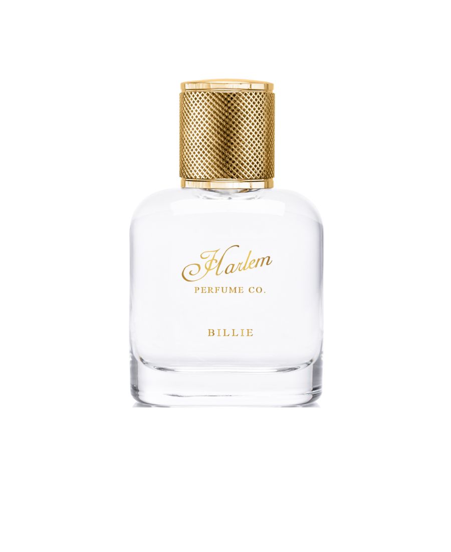 This is an image of our Billie eau de Parfum bottle against a white background. The bottle is clear with gold letters that say Harlem Perfume Co and the word Billie as the name of the fragrance.
