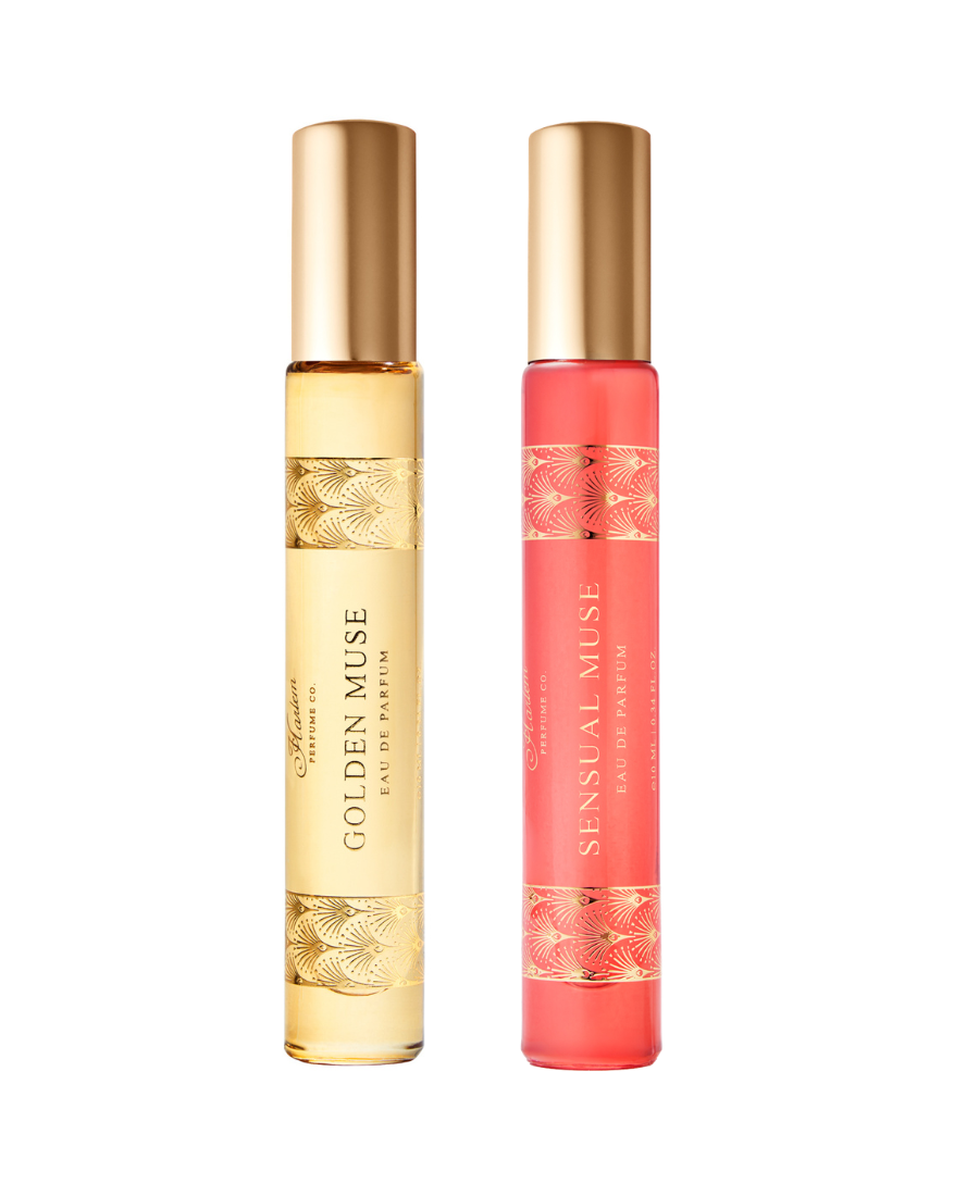 Two perfume bottles, one red and one gold, on a white background.