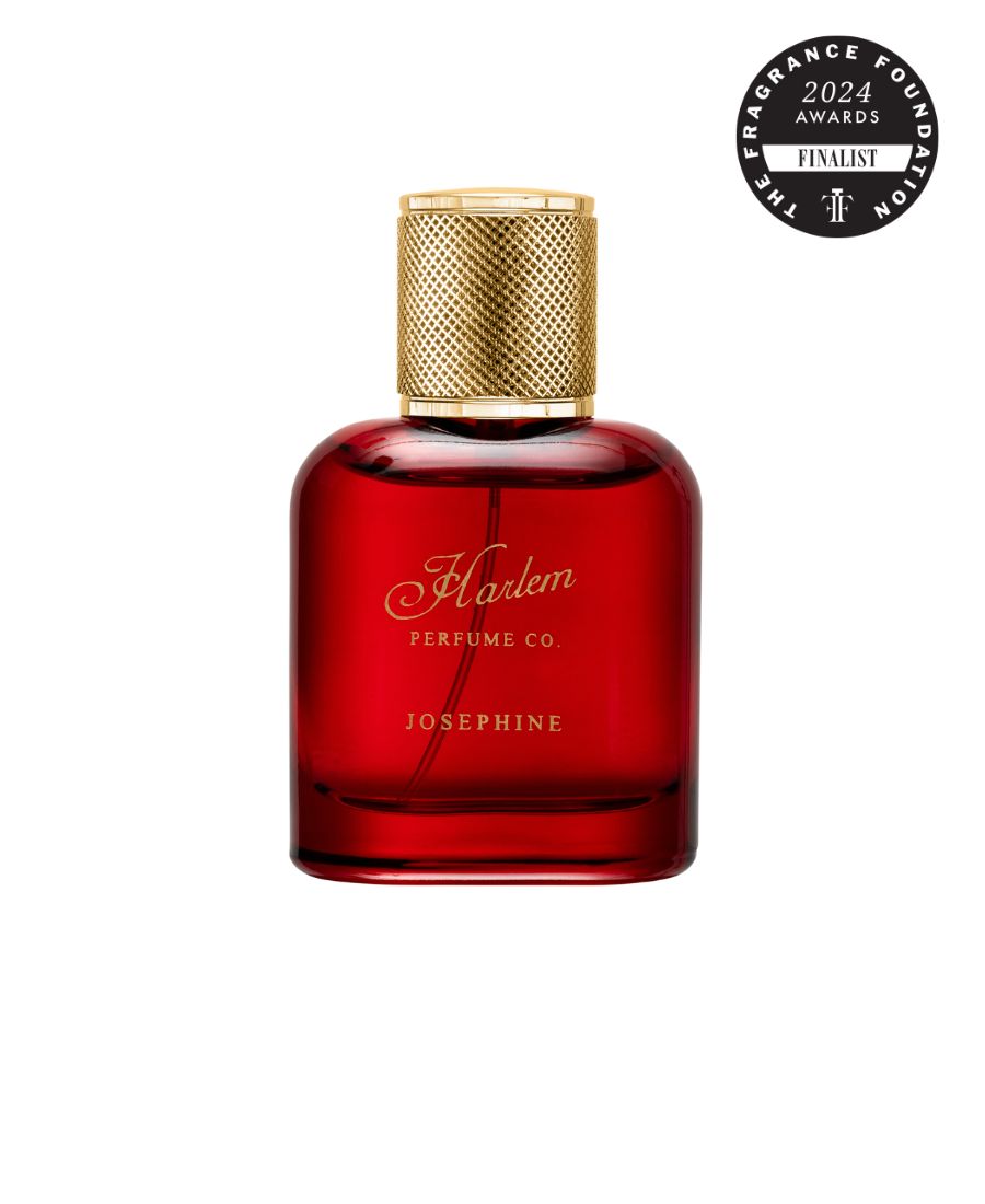 Image of Josephine eau de parfum - in a red translucent bottle with a gold cap.