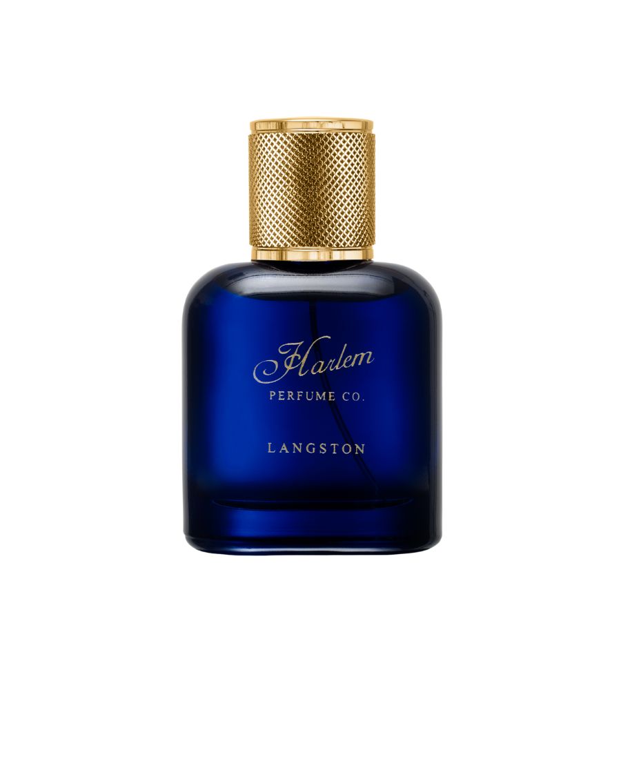 A beautiful blue perfume bottle called Langston with a textured gold cap with a white background.